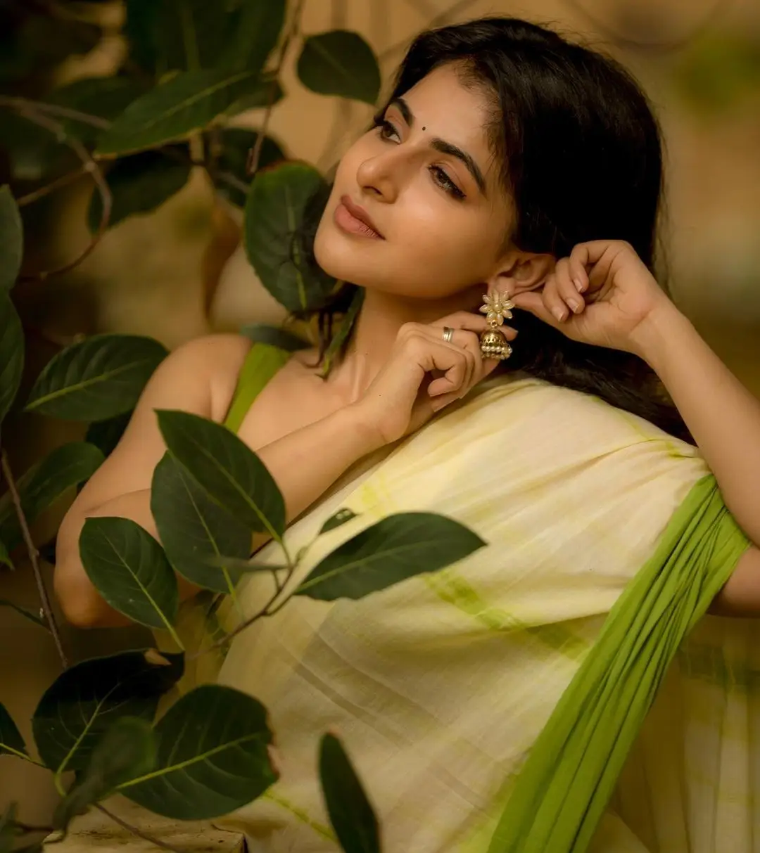 Indian Actress Iswarya Menon In Traditional Green Saree Sleeveless Blouse